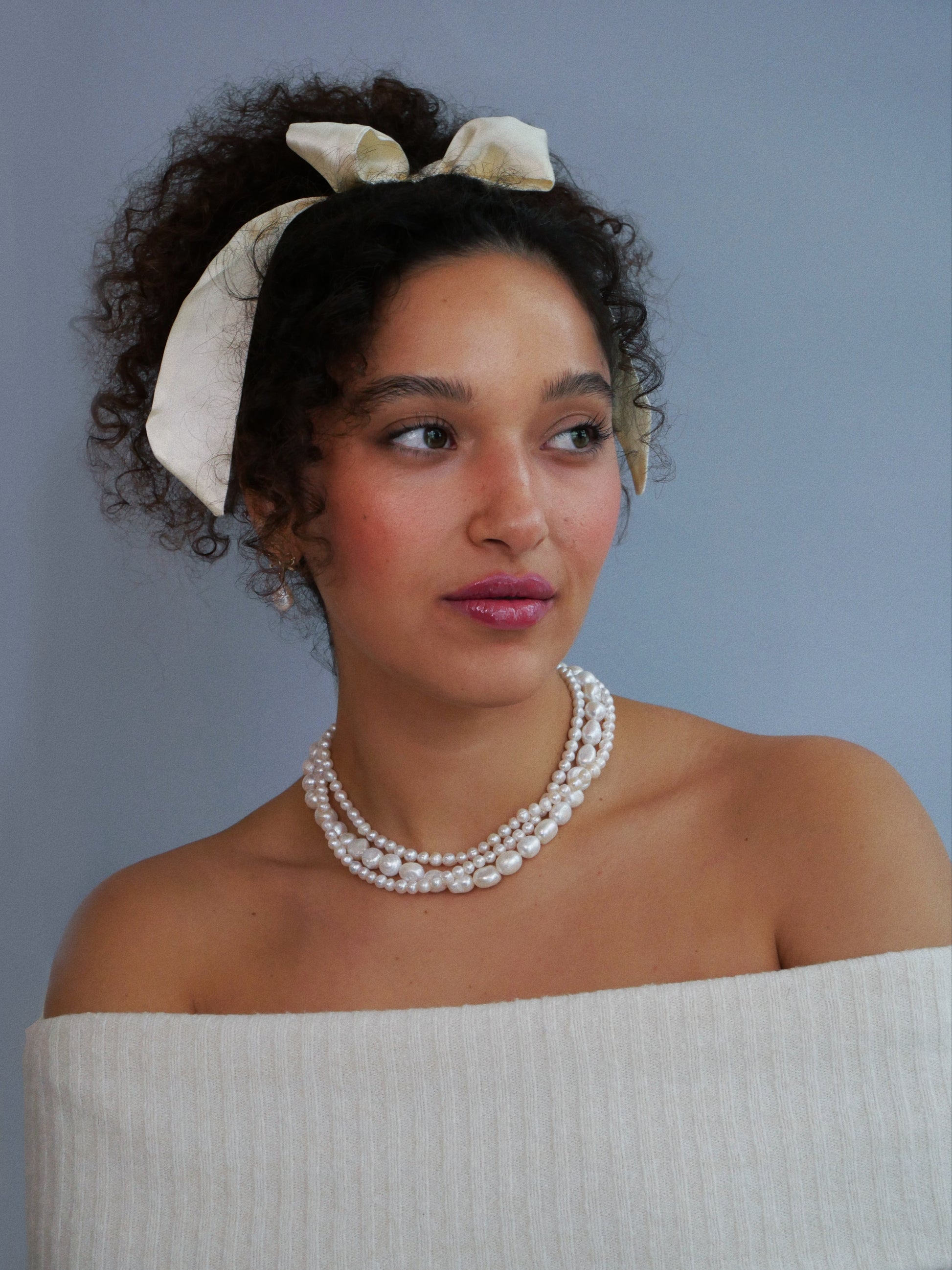 Curled hair model  white bow white pearl  earrings 14K gold  pearl necklace